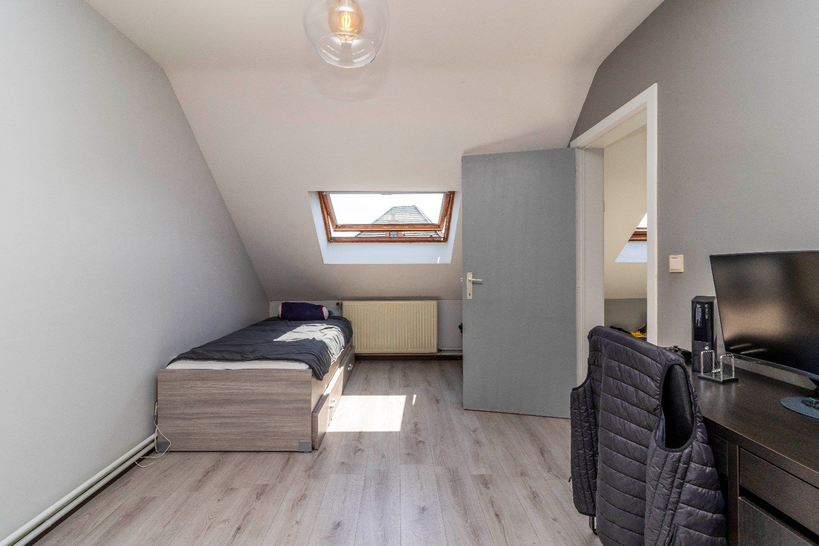 Ruim duplexappartement met gelijkvloerse handelsruimte foto 13