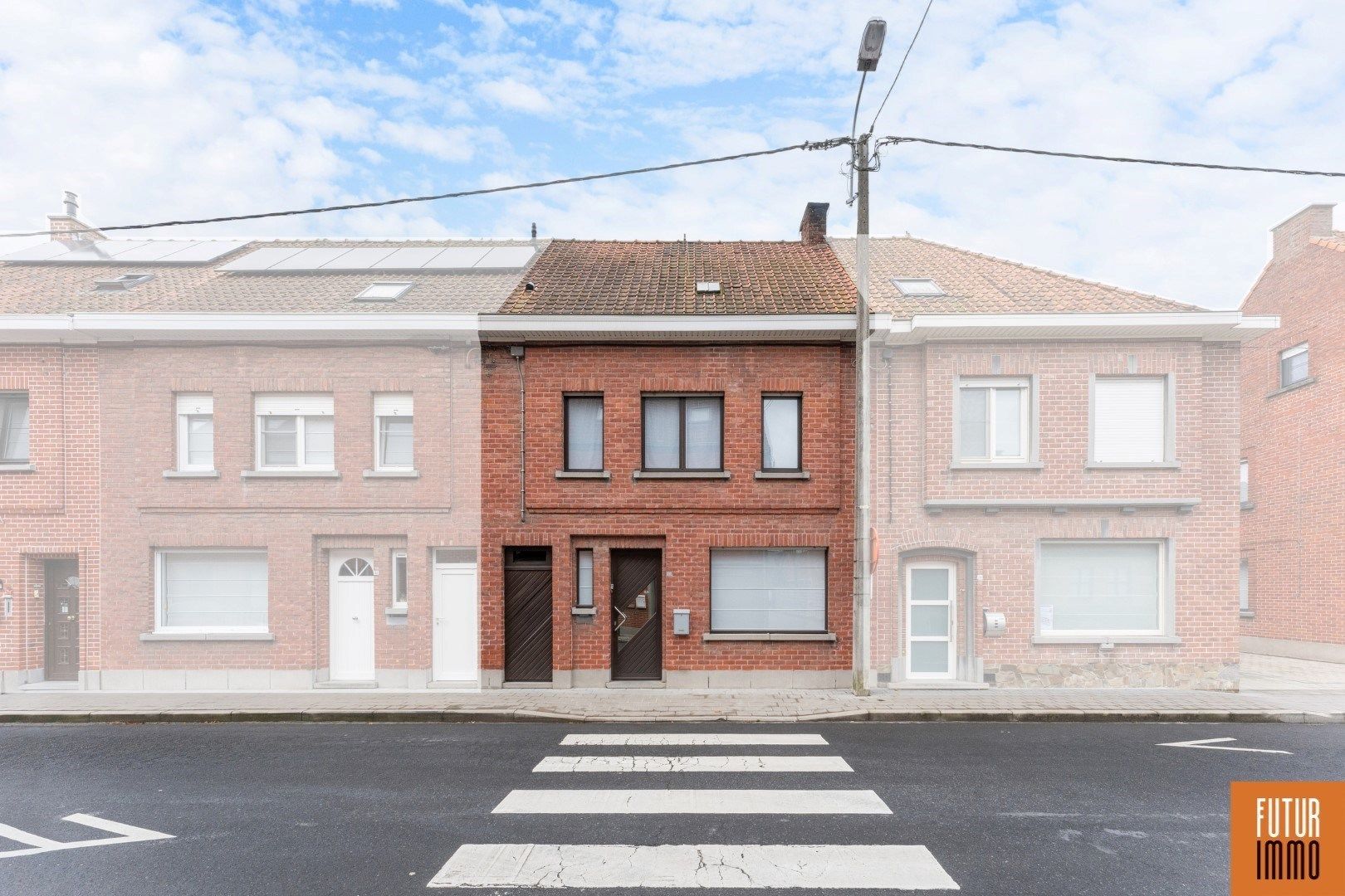 Te moderniseren woning mét garage en uitweg foto 1