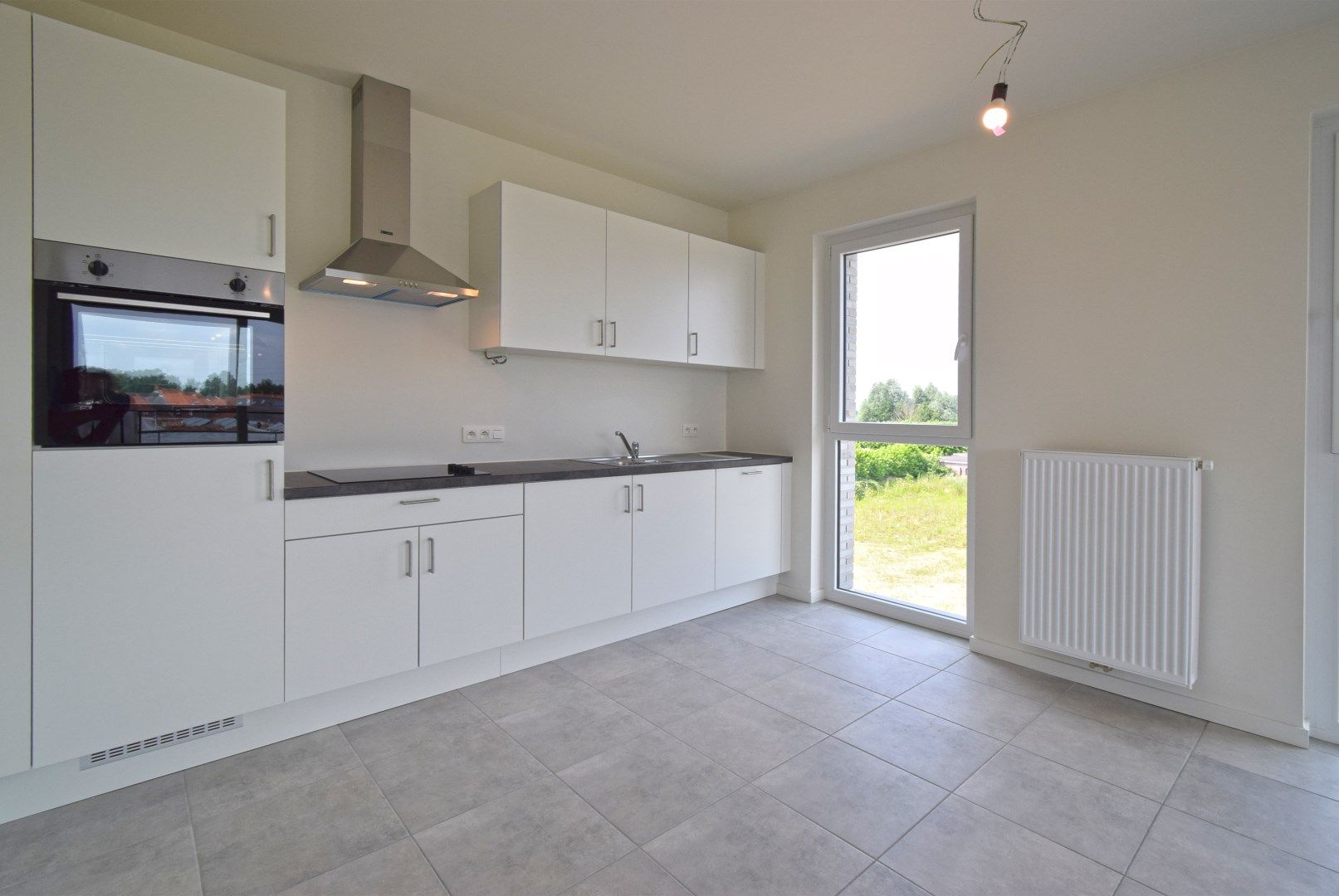 INSTAPKLAAR NIEUWBOUWAPPARTEMENT MET RUSTIGE LIGGING foto 4