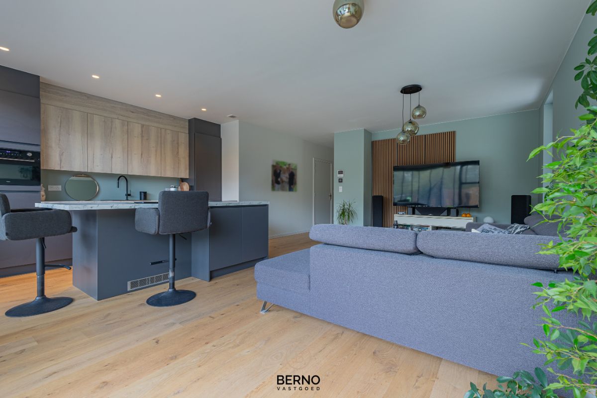 Recent gelijkvloers appartement met zonnig terras en tuintje in Opstal foto 3