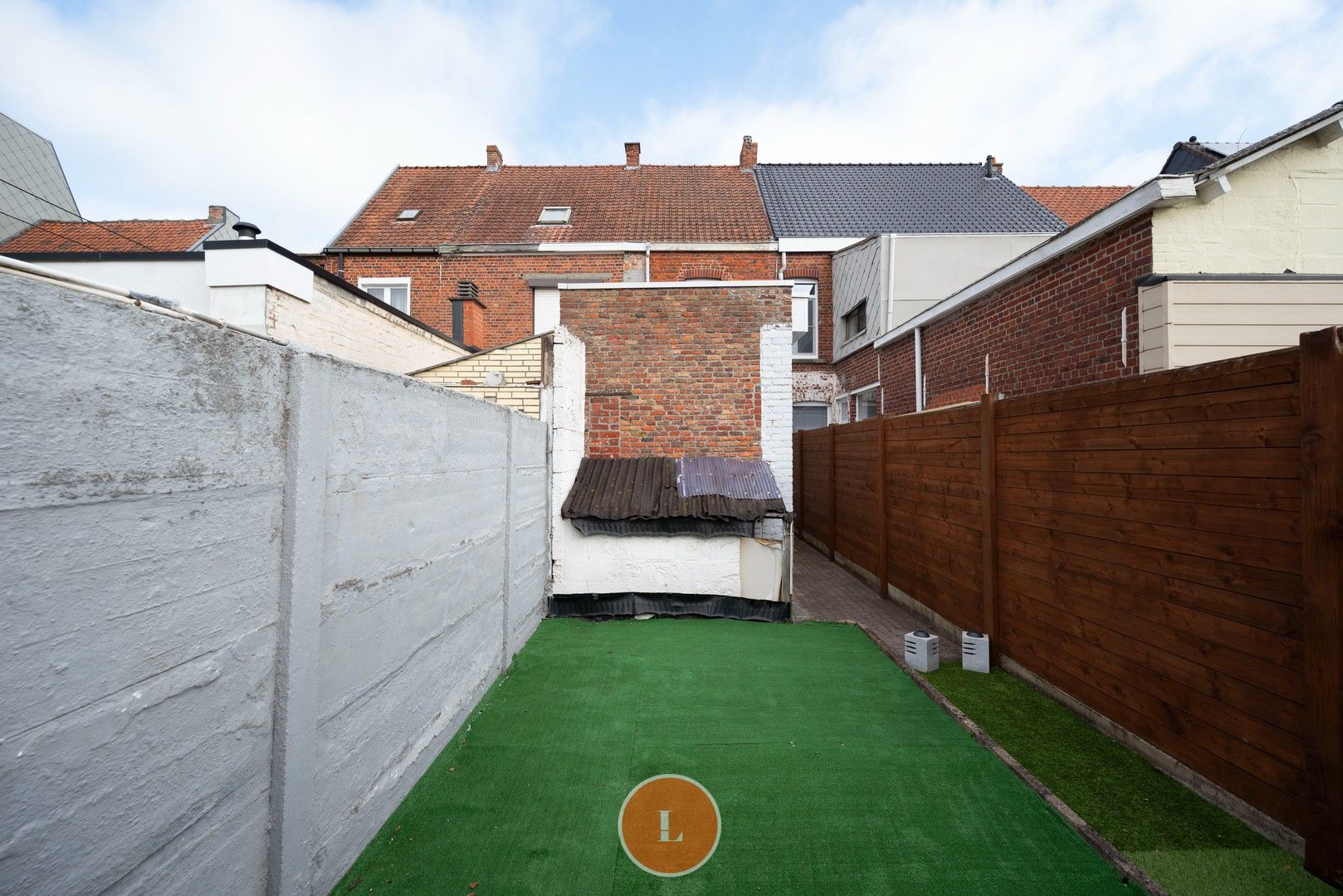 Te renoveren woning te koop in centrum Menen foto 14