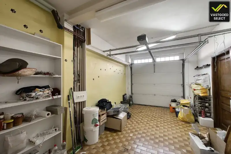 Rijwoning met uitzonderlijk perceel van 1.632 m² en landelijk uitzicht in het centrum van Eeklo foto 9