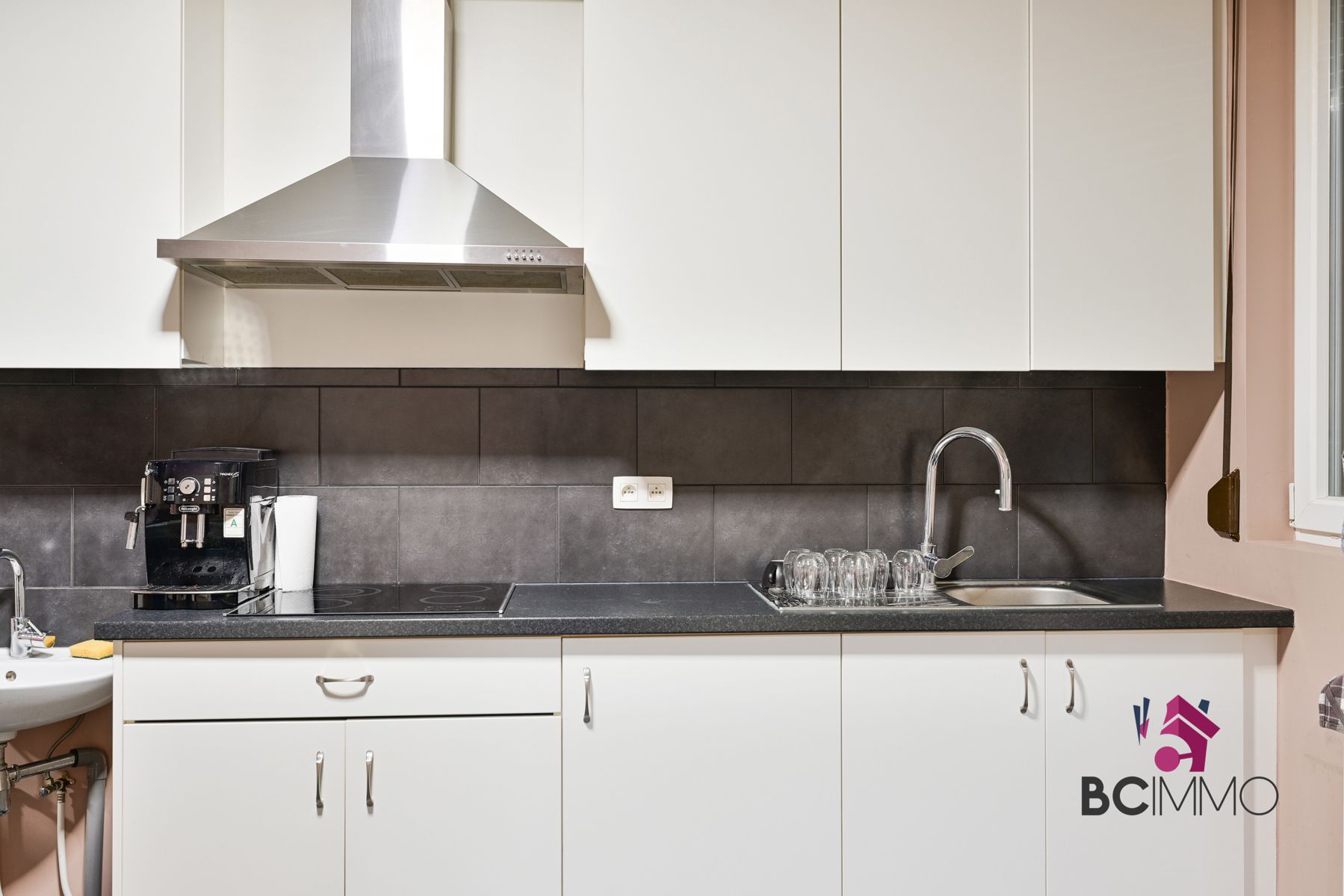 Handelswoonst met een triplex appartement te koop in Genk foto 23