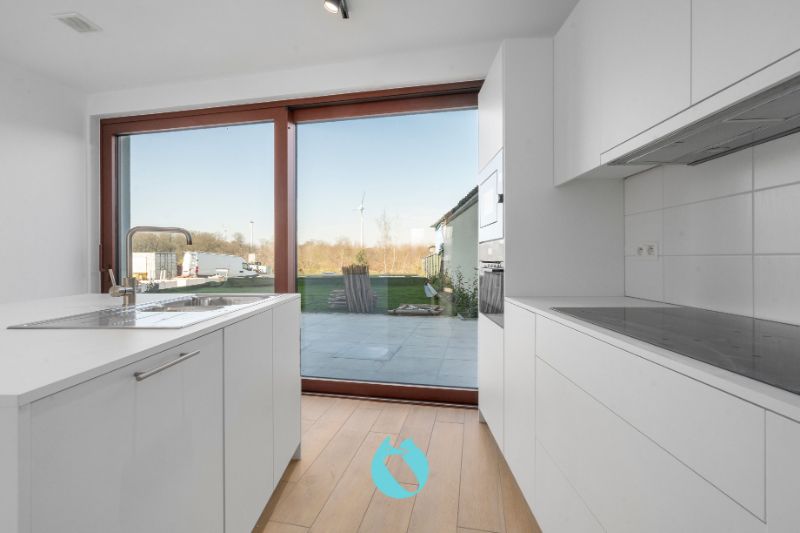 Ontdek dit prachtige duplex-nieuwbouwappartement, met drie slaapkamers en twee badkamers foto 4