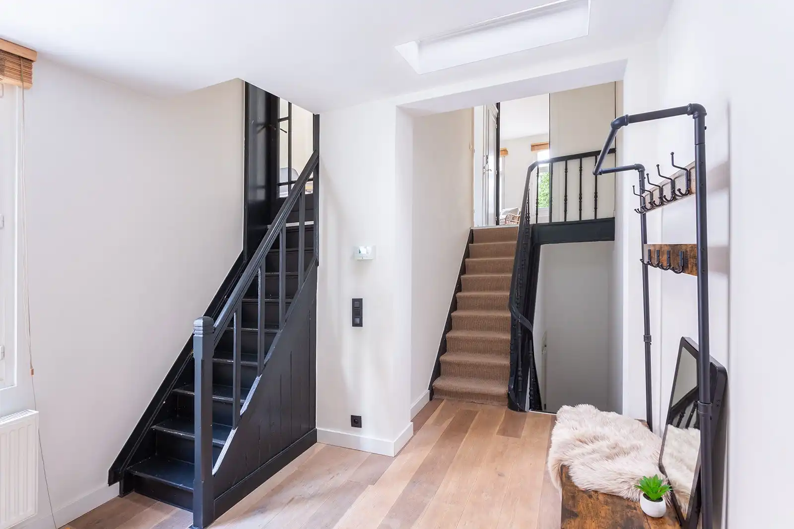 Duplex met terras in bruisende buurt foto 17