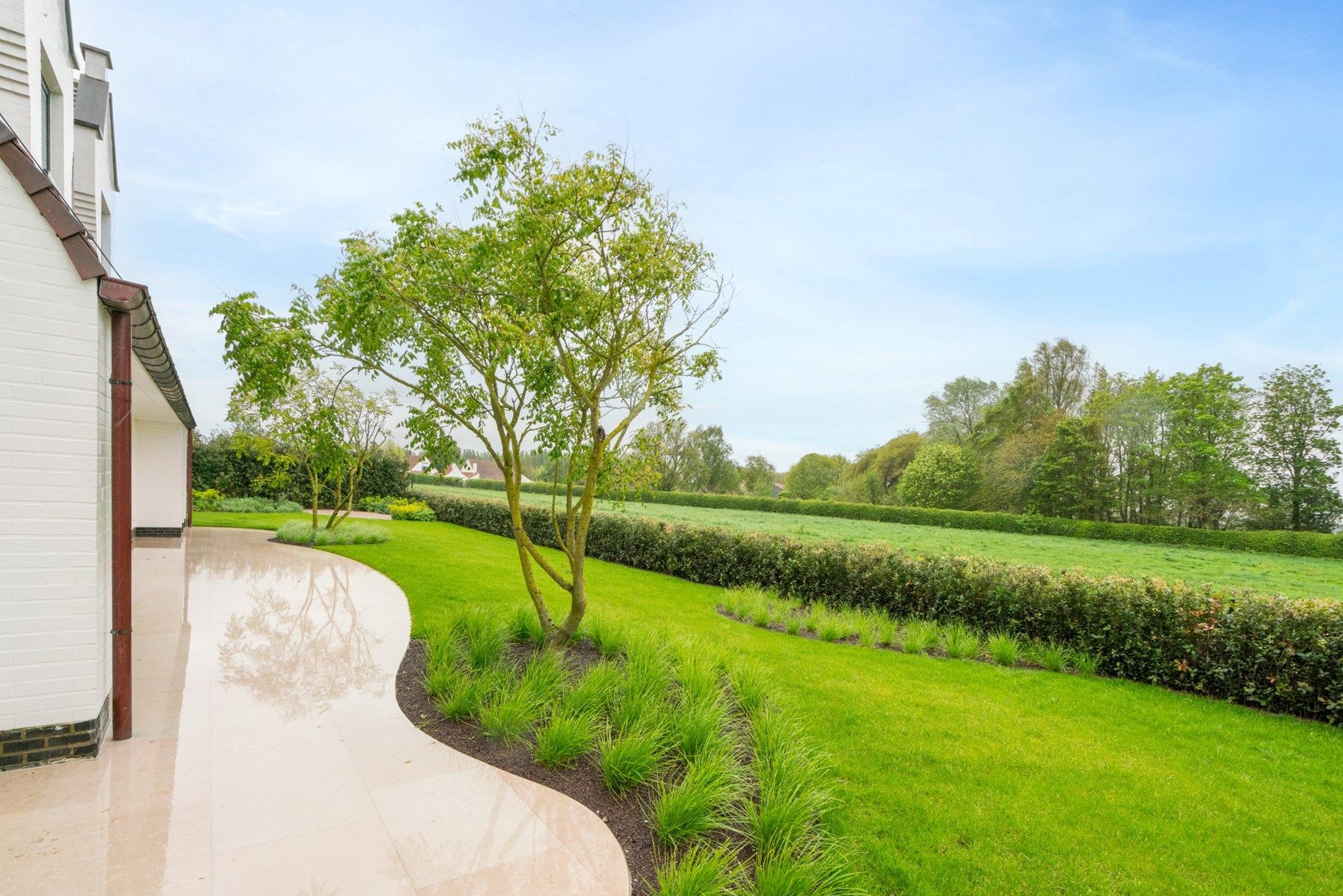 Prachtig gerenoveerde alleenstaande villa met zwembad en een OPEN ZICHT over de polders.  foto 20