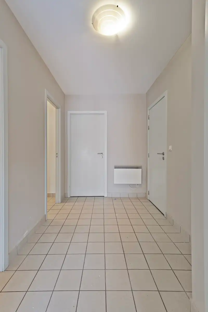 Gelijkvloersappartement met tuintje en garage foto 7