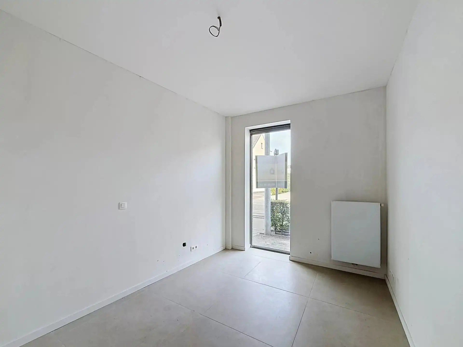 Luxueus en modern afgewerkt gelijkvloers appartement met tuin en 1 slaapkamer. foto 18