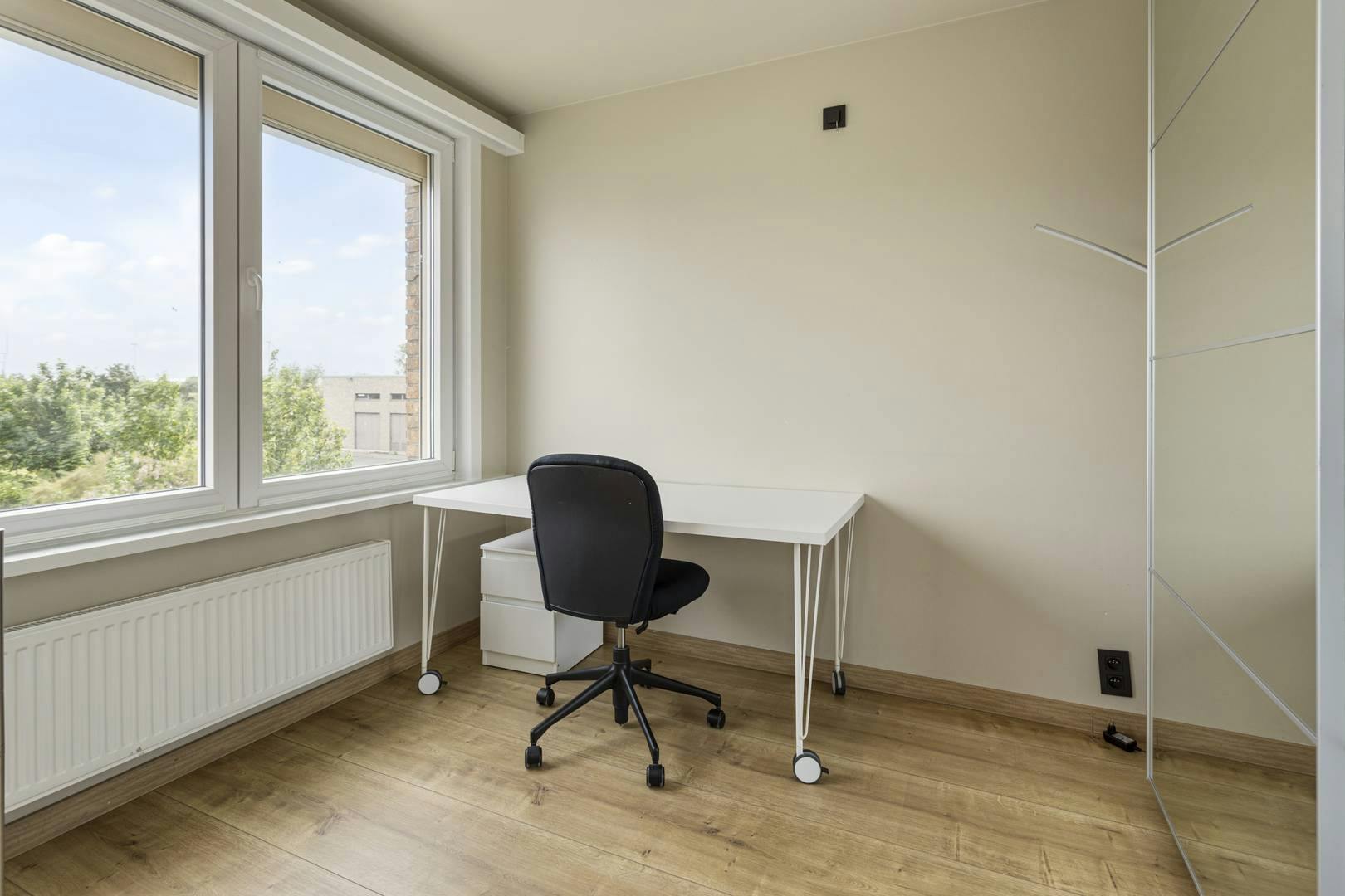 Lichtrijk en instapklaar huis met tuin te koop in Heist foto 11