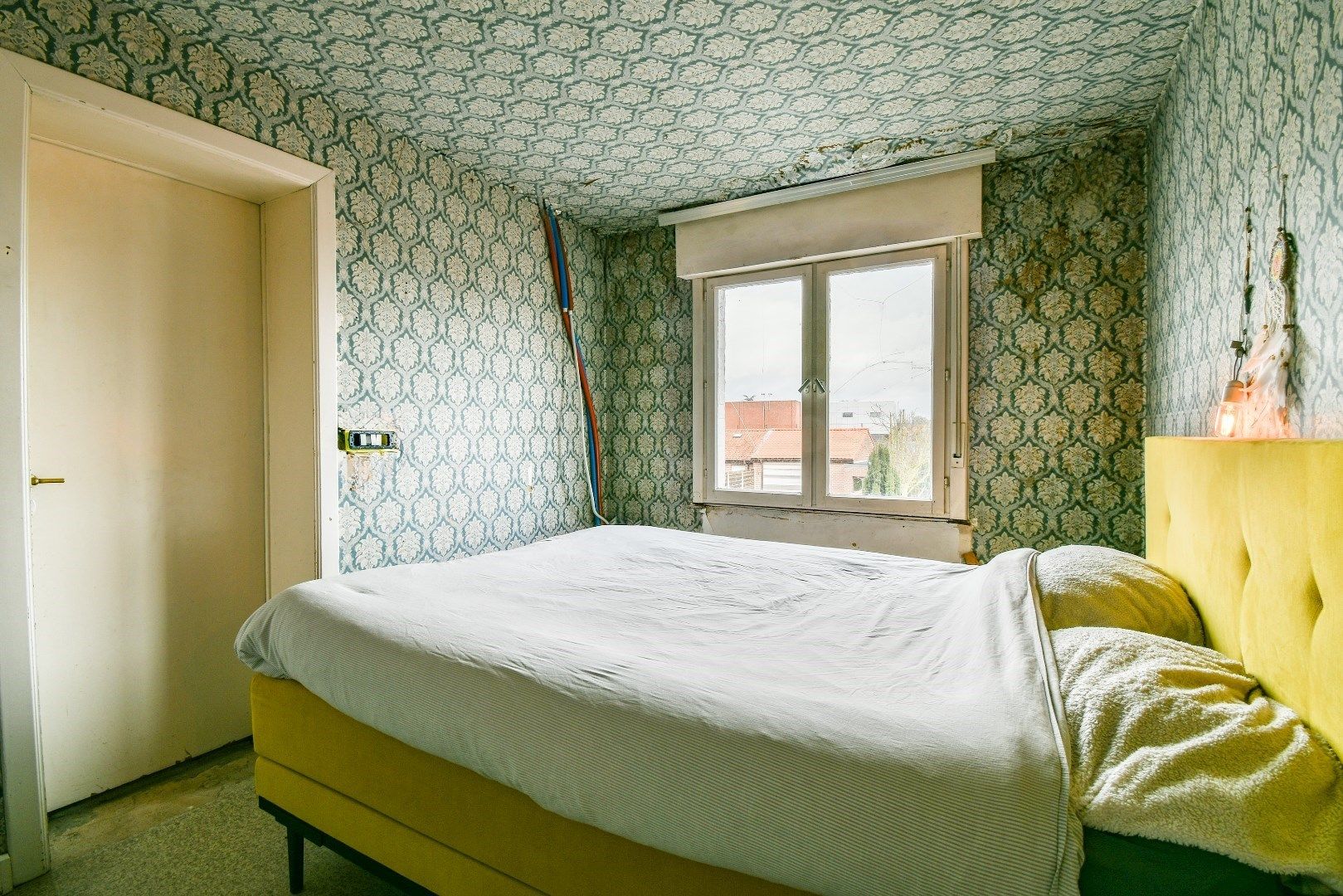 Te renoveren woning in het hart van Torhout! foto 15