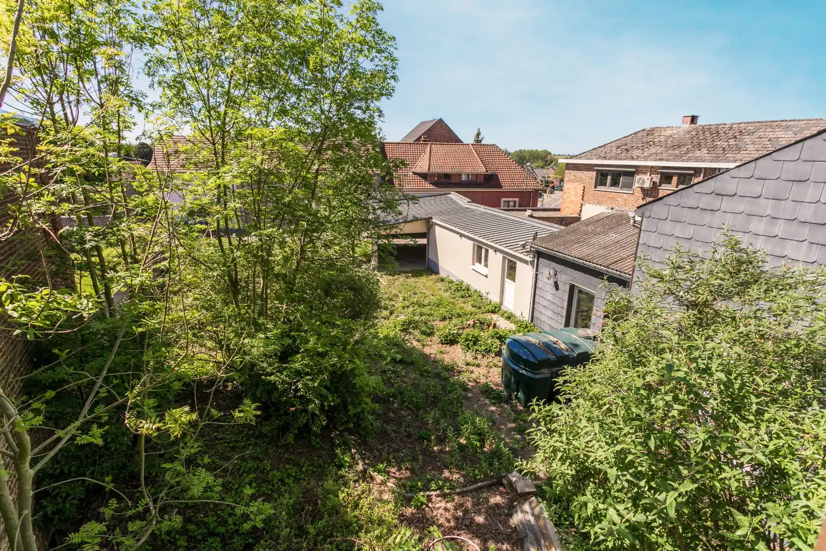 Te renoveren eigendom (317 m²) met veel potentieel, ruime tuin (6a 42ca) en dubbele achterliggende carport met toegang tot de achterliggende straat in Kester foto 30