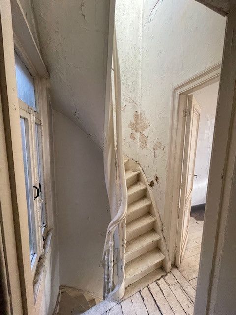 Volledig te renoveren rijwoning met karakter in hartje Borgerhout! foto 6