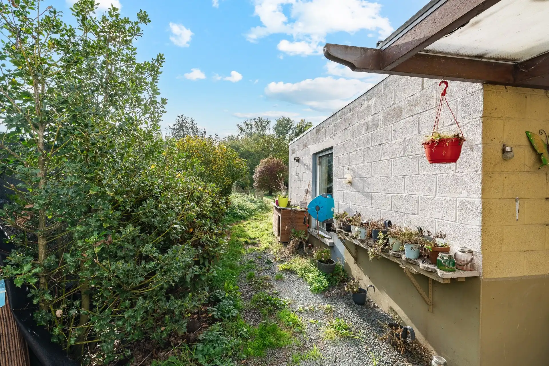 Ruime halfopen bebouwing met mooie tuin, garage en tal van mogelijkheden foto 20