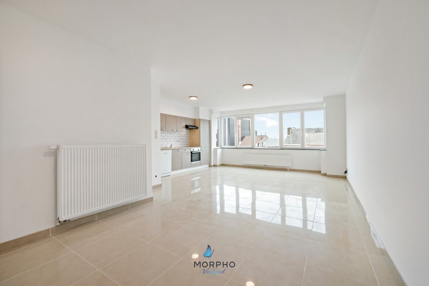 Modern en energiezuinig 2-slaapkamerappartement op de derde verdieping in hartje Temse! foto {{pictureIndex}}