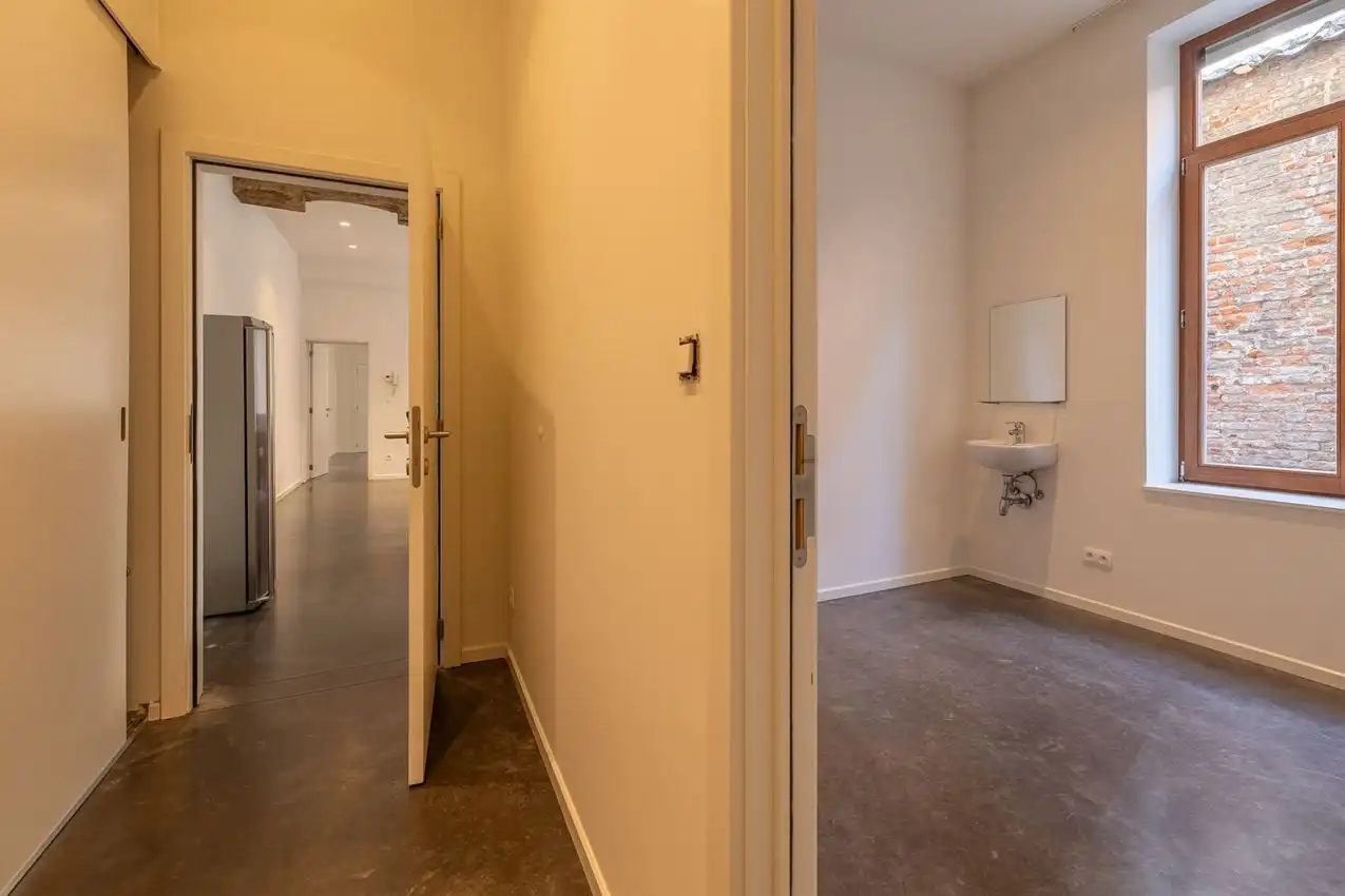 Ruim gelijkvloers appartement met zonnige tuin op toplocatie foto 15