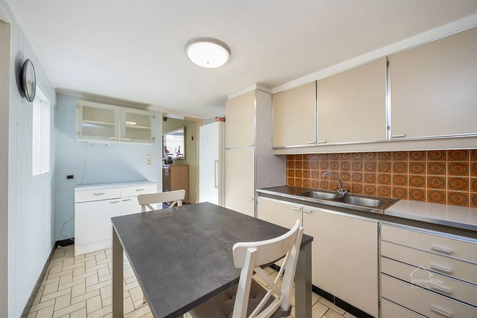 Te renoveren rijwoning met tuintje foto 5