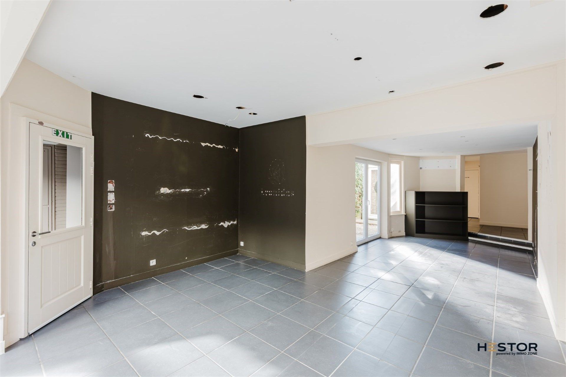 Veelzijdig handelspand op toplocatie in hartje Hamme!  foto {{pictureIndex}}