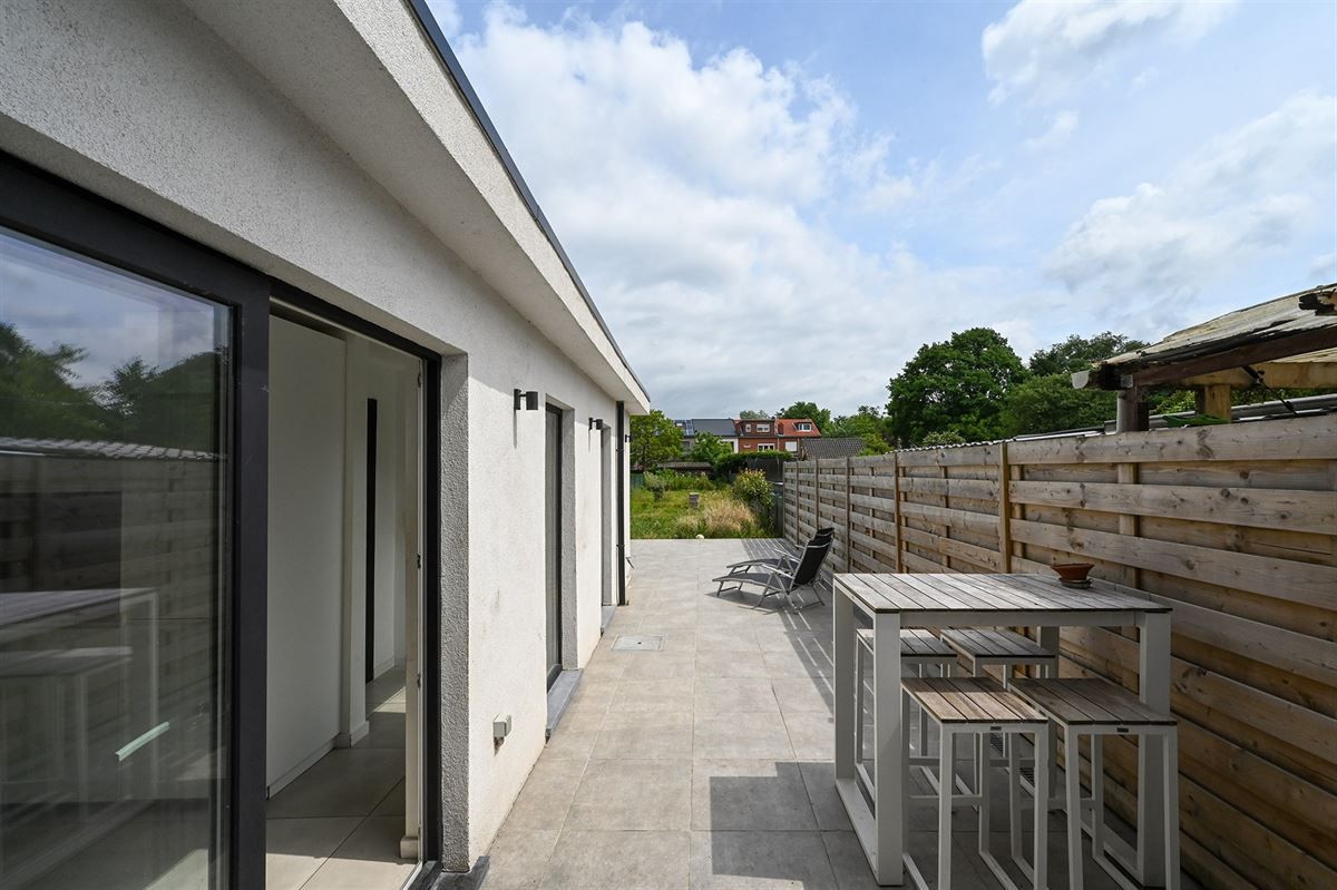 Lichte woning met diepe tuin foto 11