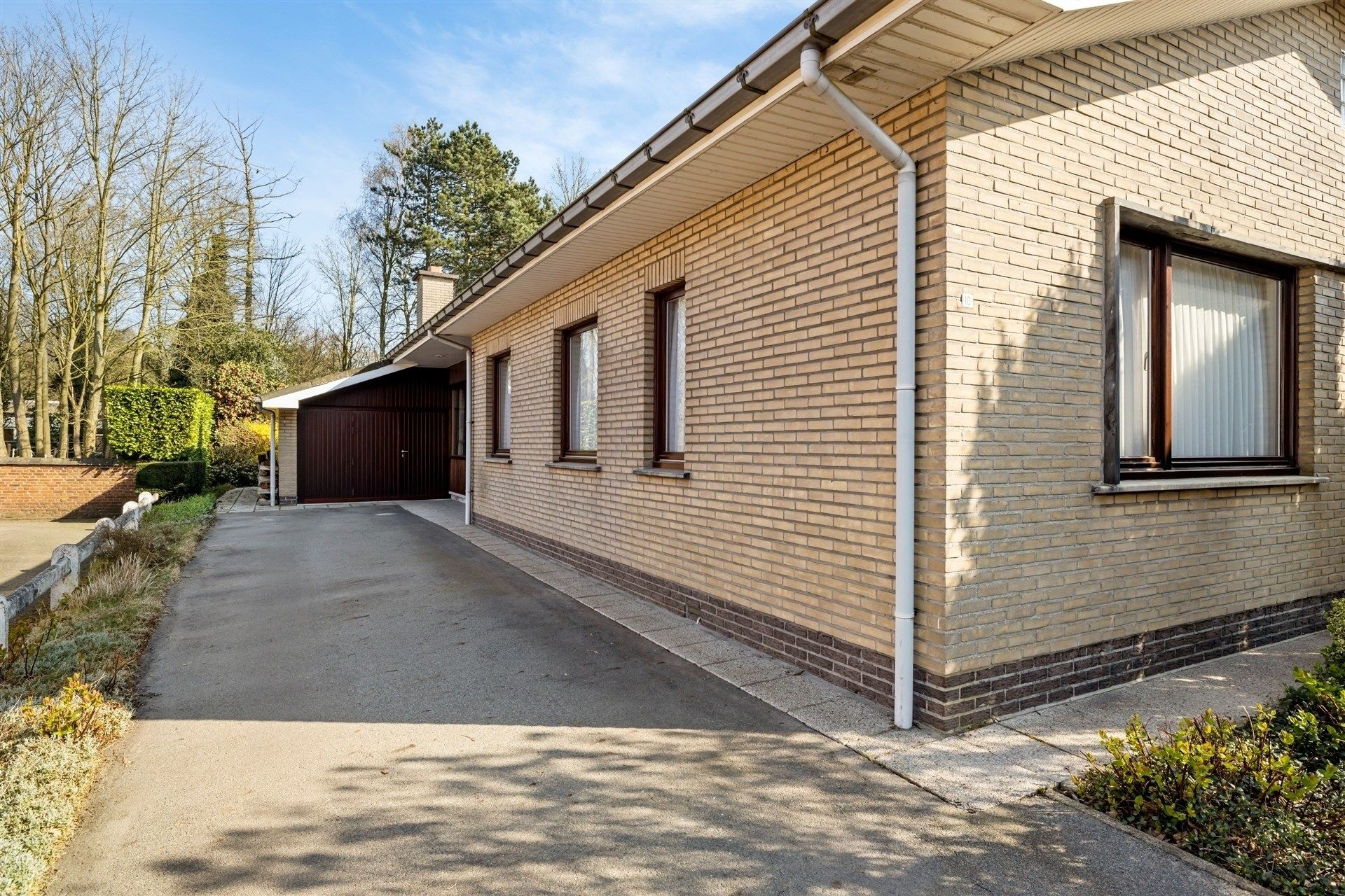 Uitstekend gelegen gezinswoning (type bungalow) met 4 slaapkamers, garage en een aangename tuin (1.067m²) foto 31