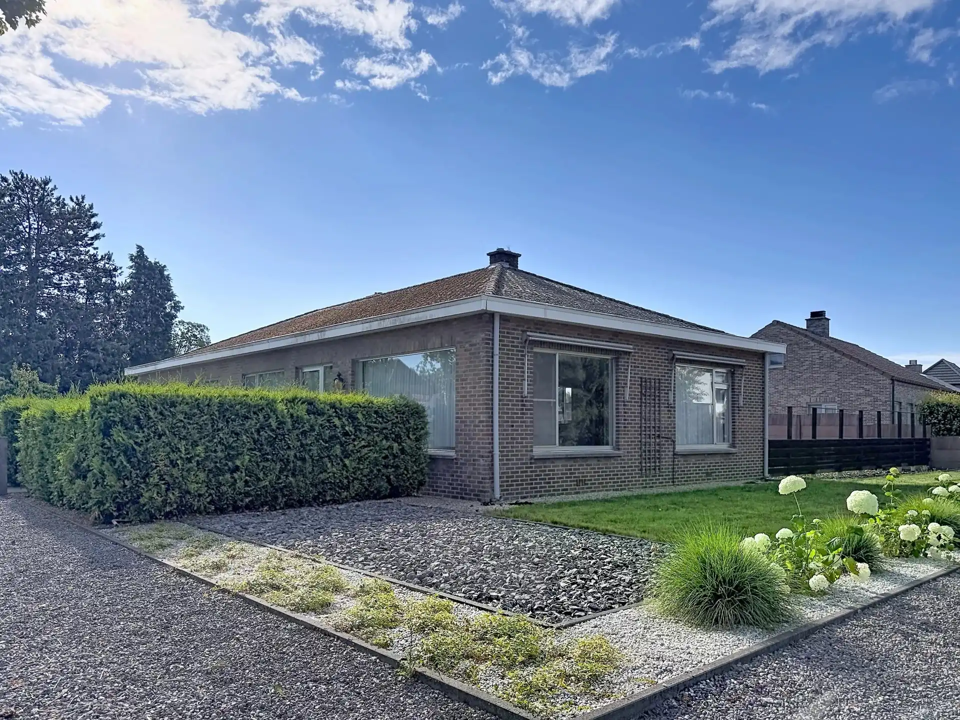 Te renoveren gelijkvloerse woning met 3 slaapkamers op een ruim perceel. foto 30