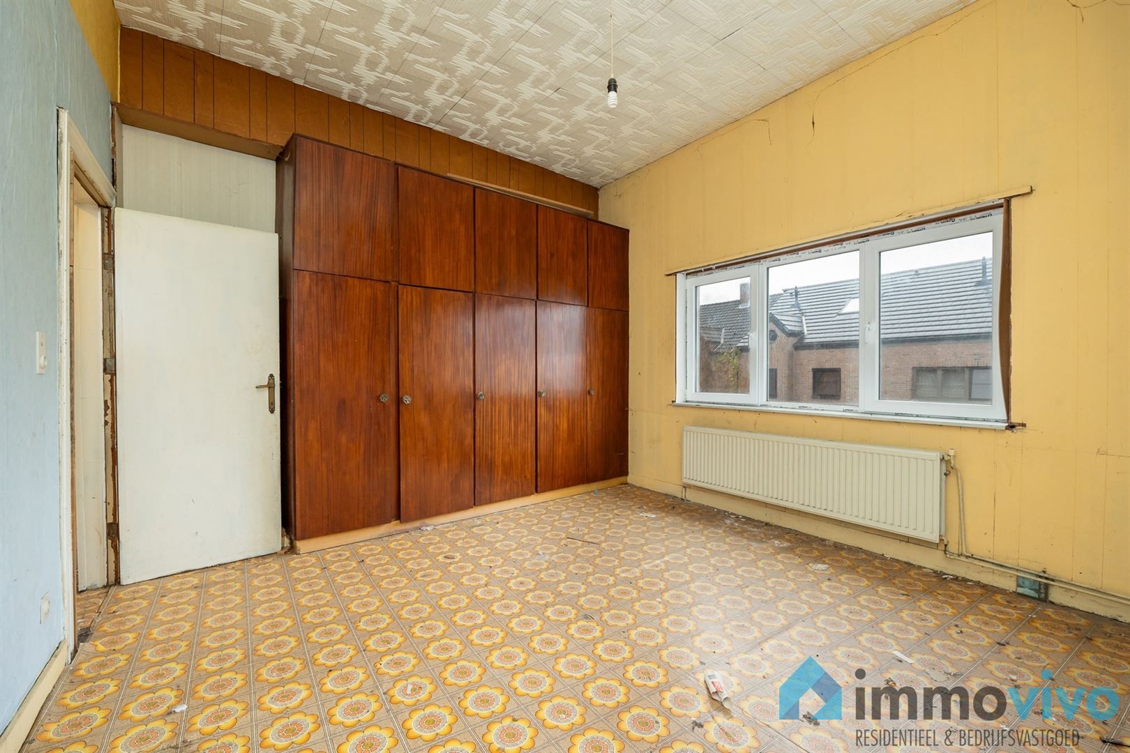 Ruime te renoveren gezinswoning met 4 slpk's en tuin foto 22