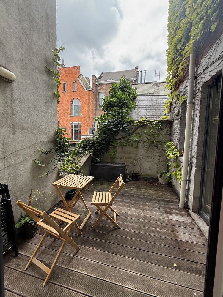 In het hart van Antwerpen, maar toch in een rustige straat, bevindt zich dit appartement foto 16