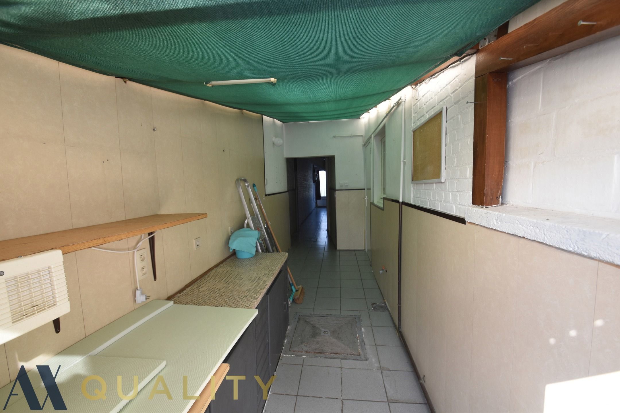 te renoveren Half-open woning met koer op 01 are 77 ca foto 21