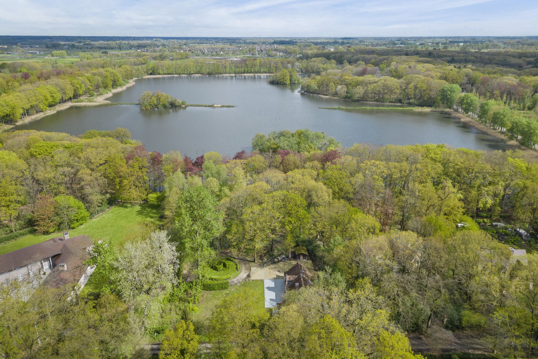 Uitzonderlijke gelegen villa in het Loveld met zicht op natuurgebied de Kraenepoel! foto 4