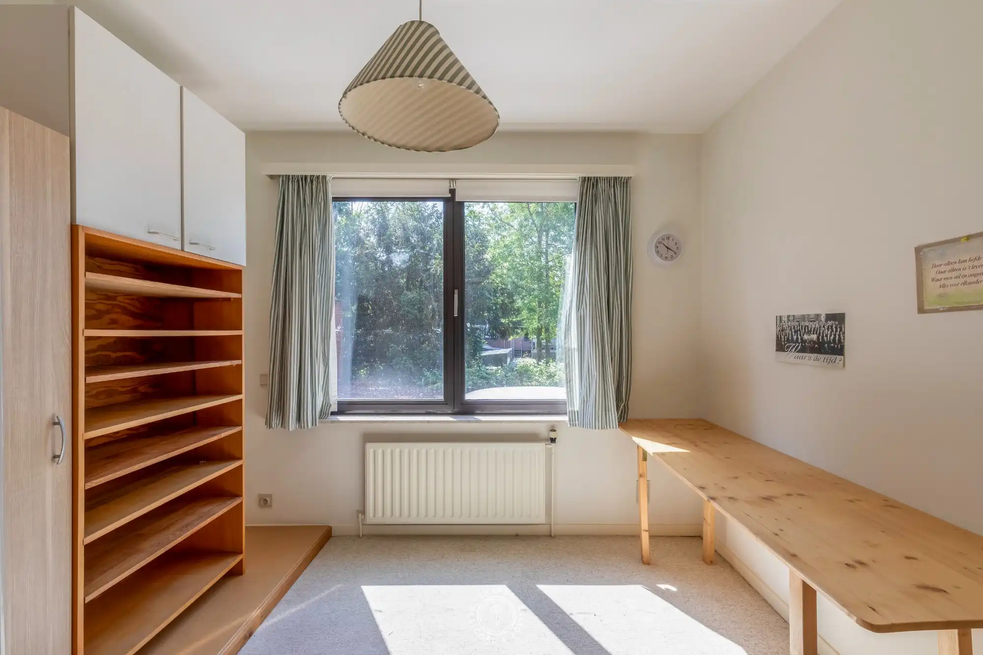 Ruim en lichtrijk appartement met 3 slaapkamers op toplocatie met autostaanplaats aan het Hendrik Heymanplein foto 10