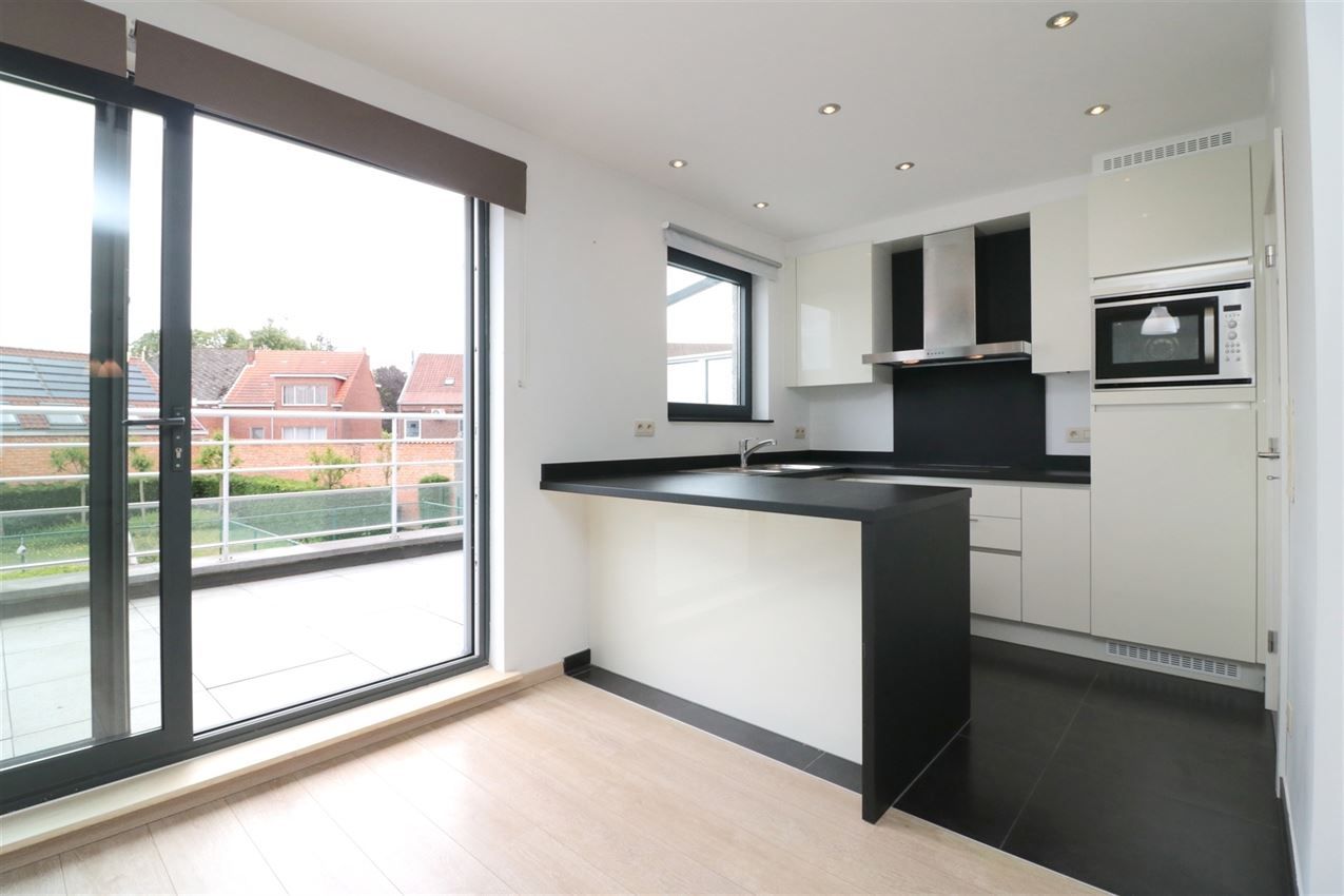 Triplex met groot zuidterras, garage, nabij E314 foto 16