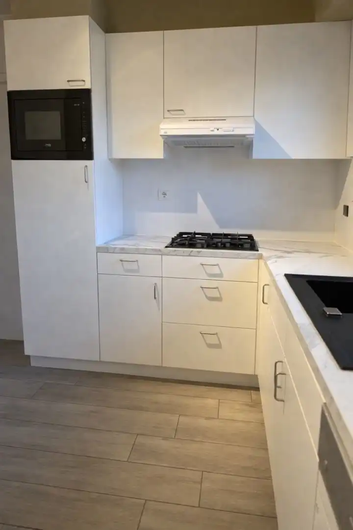 Te huur: Mooie gerenoveerde en energiezuinige woning met 3 slaapkamers in Houthalen centrum foto 11