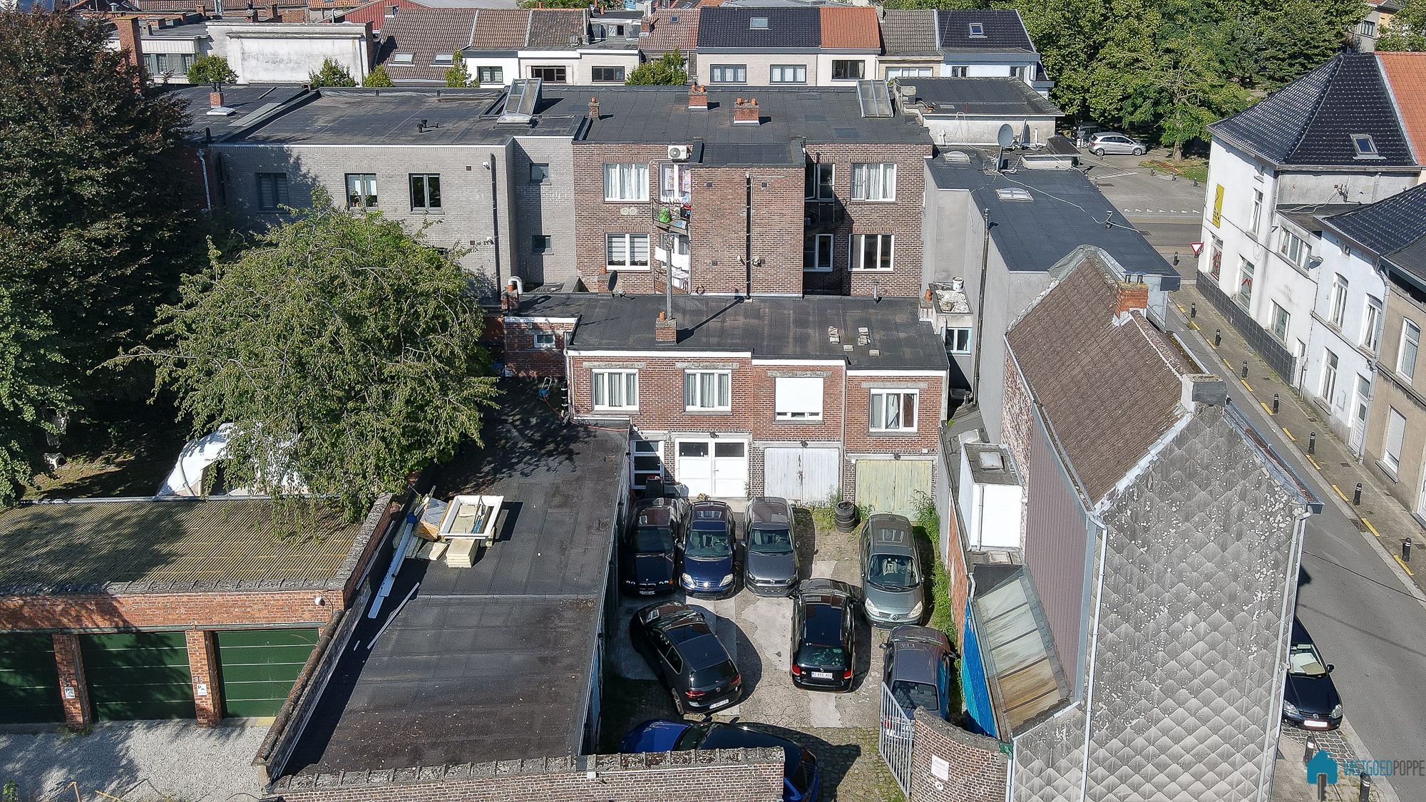 Opbrengsteigendom: 3 appartementen, 4 garageboxen foto 2