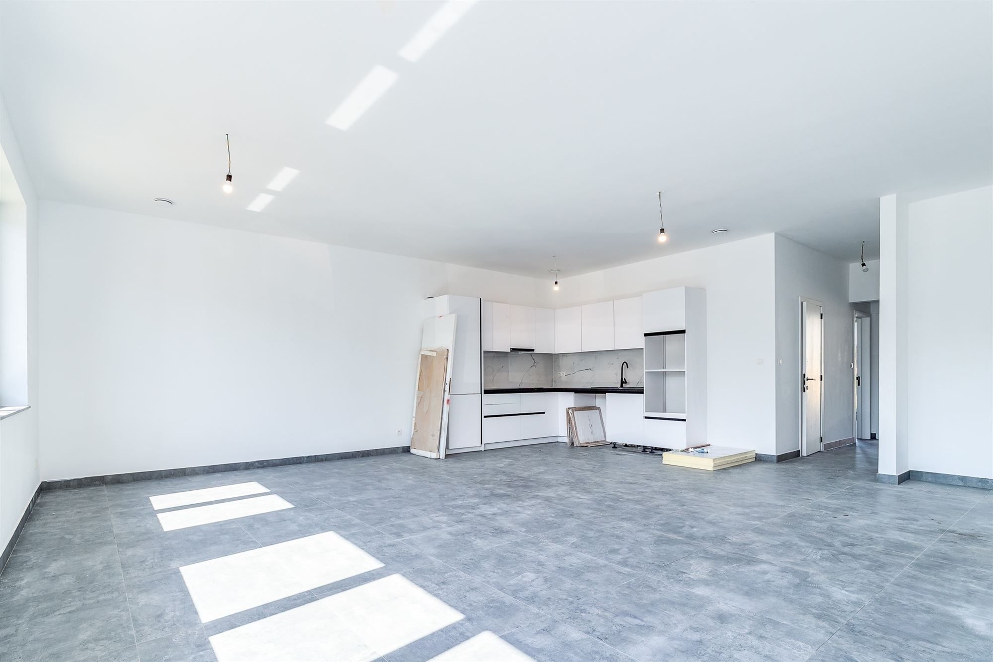 Gelijkvloers nieuwbouw appartement met 3 kamers en ruime tuin te Borsbeek foto 4