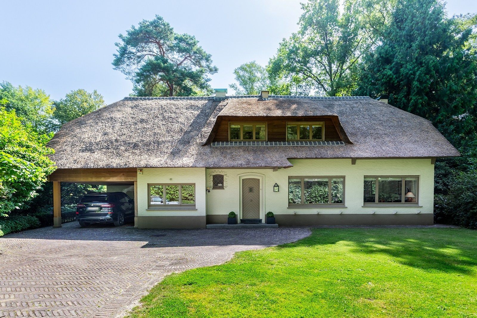 Charmante rietgedekte villa in bosrijke omgeving foto 3