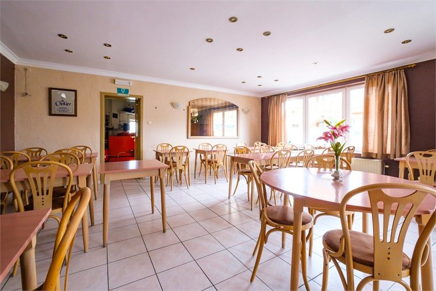 HANDELSHUIS MET VEEL POTENTIEEL IN HET CENTRUM VAN GINGELOM foto 6