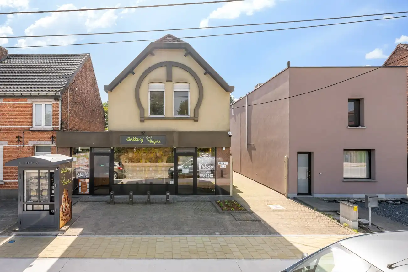 Strategisch gelegen handelspand met winkelruimte (bakkerij) met inpandige garage, grote werkruimte (ca. 145m²) en aangename tuin met open zicht in Ertvelde! foto 28