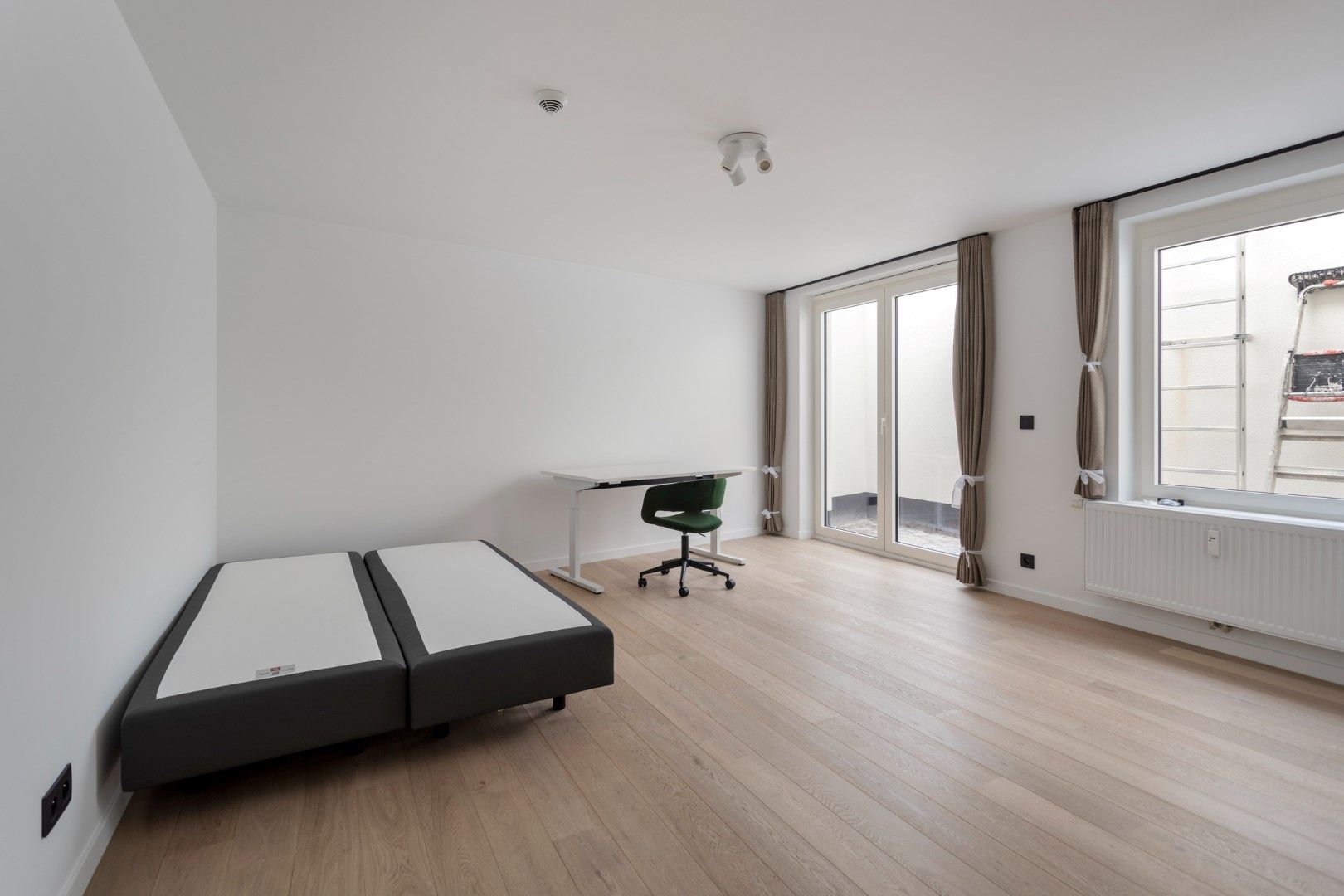 Volledig gerenoveerde studentenkamer in residentie met 29 studentenkamers met eigen sanitair in hartje Leuven  foto 2