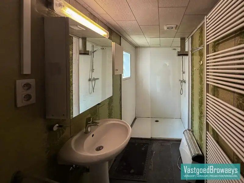 Centraal gelegen basiswoning met tuin en parkeergelegenheid foto 14