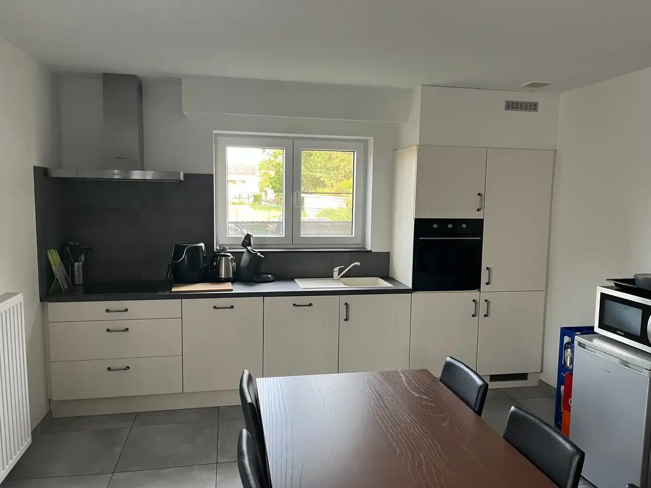 Modern gelijkvloers 1 slaapkamer appartement met ruim terras en ondergrondse parking in As! foto 3