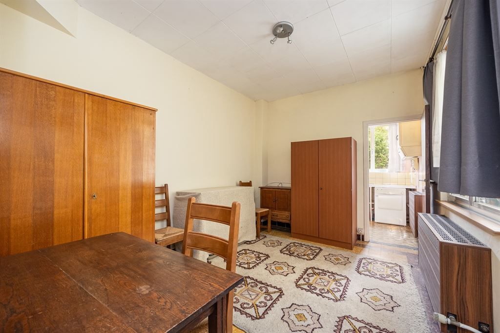 Zeer ruime, te renoveren woning met tuin foto 14