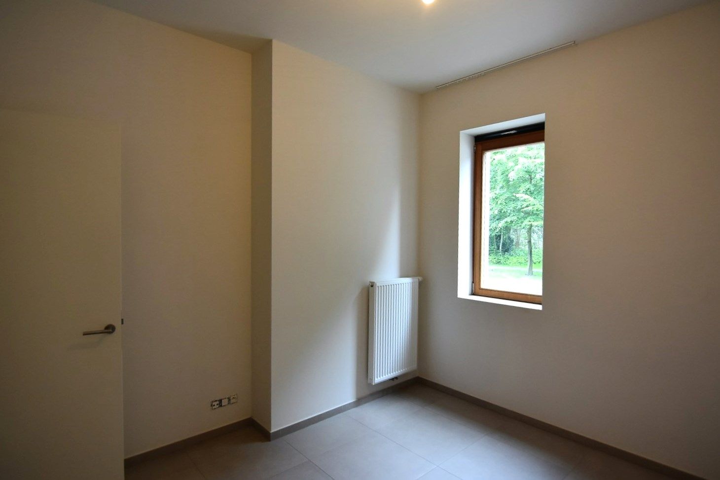 Modern gelijkvloers appartement tegenover park Pastoorsbos Beveren foto 13