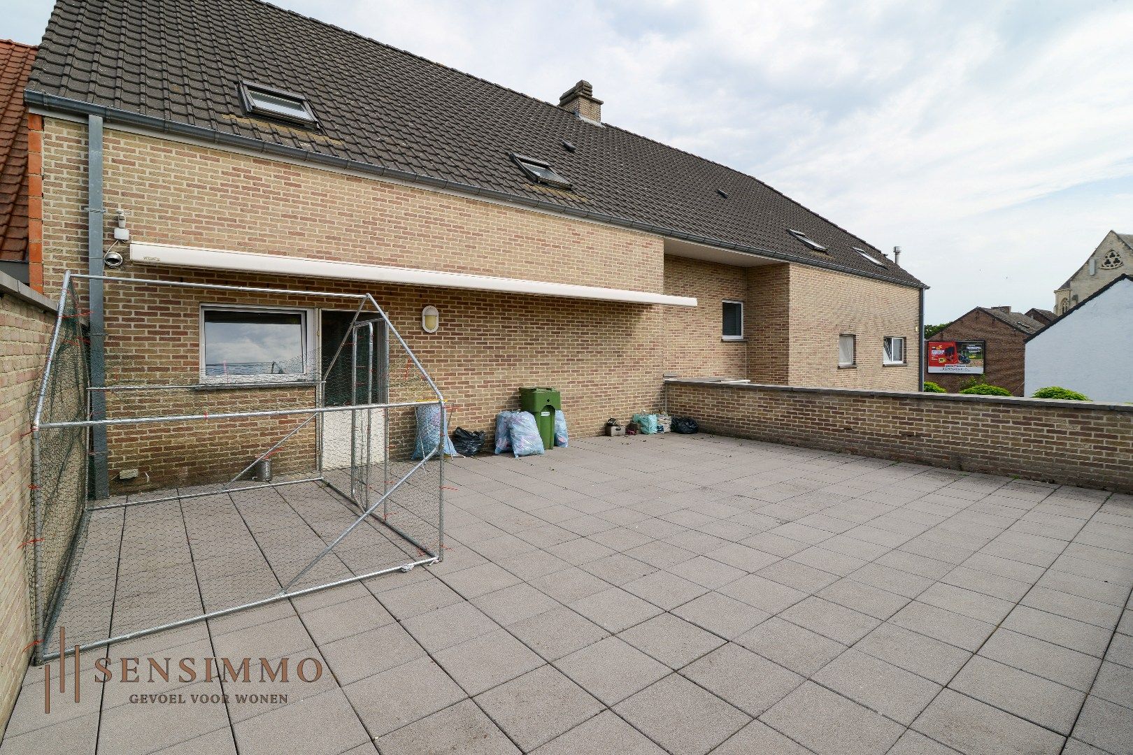 INVESTEERDERSOPPORTUNITEIT - GEBOUW MET TOONZAAL + 4 APPARTEMENTEN + MAGAZIJN + GARAGEBOXEN + BOUWGROND foto 28