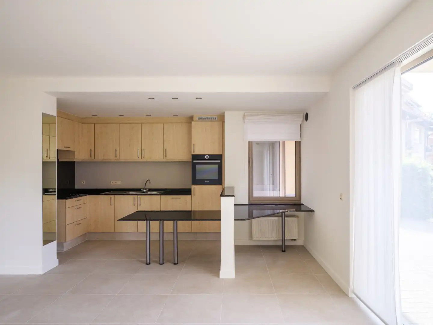 Instapklaar gelijkvloers appartement met 2 slaapkamers en zonnige privétuin foto 5