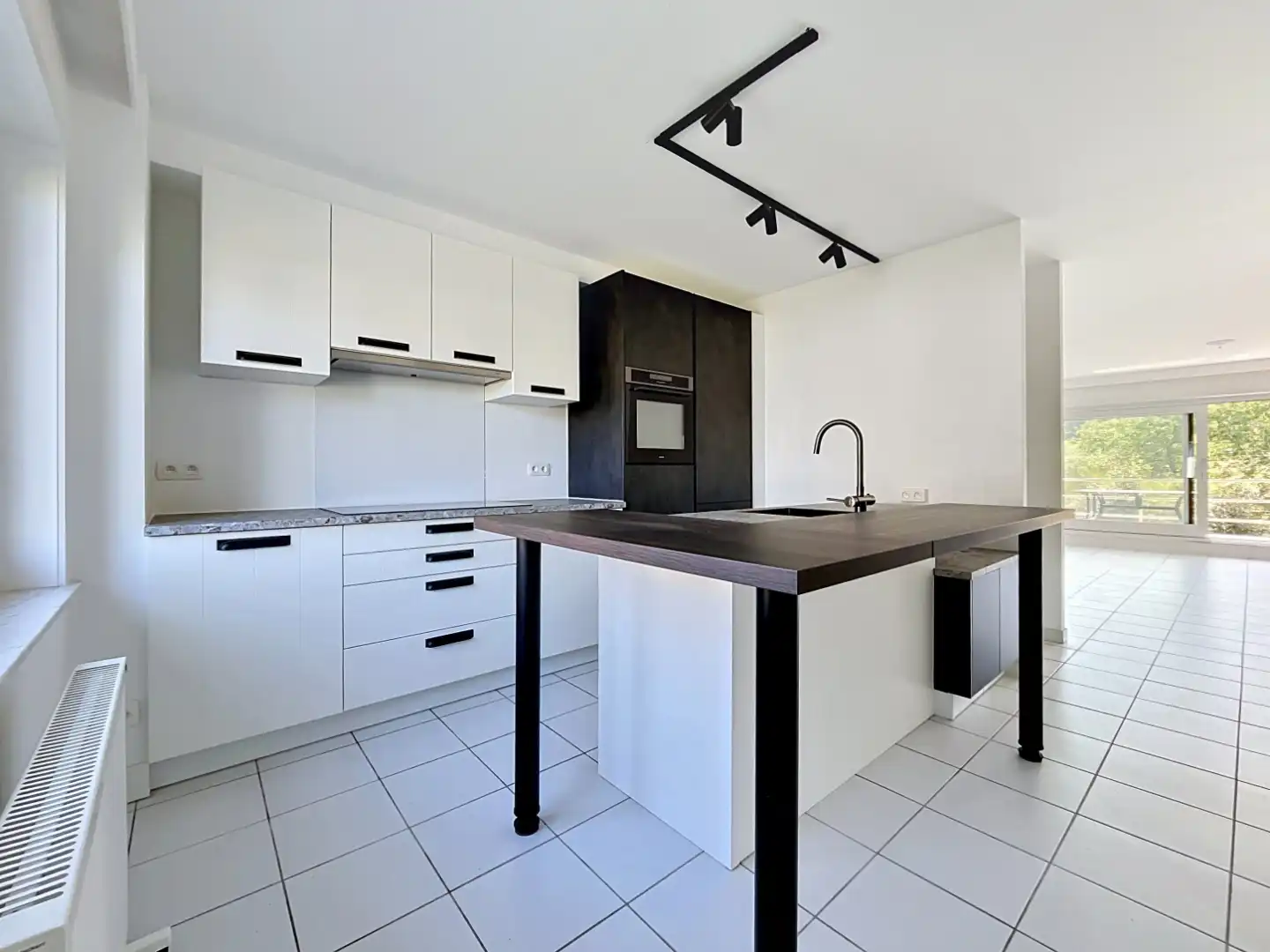 Ruim duplex appartement met 4 slaapkamers en 2 badkamers foto 3