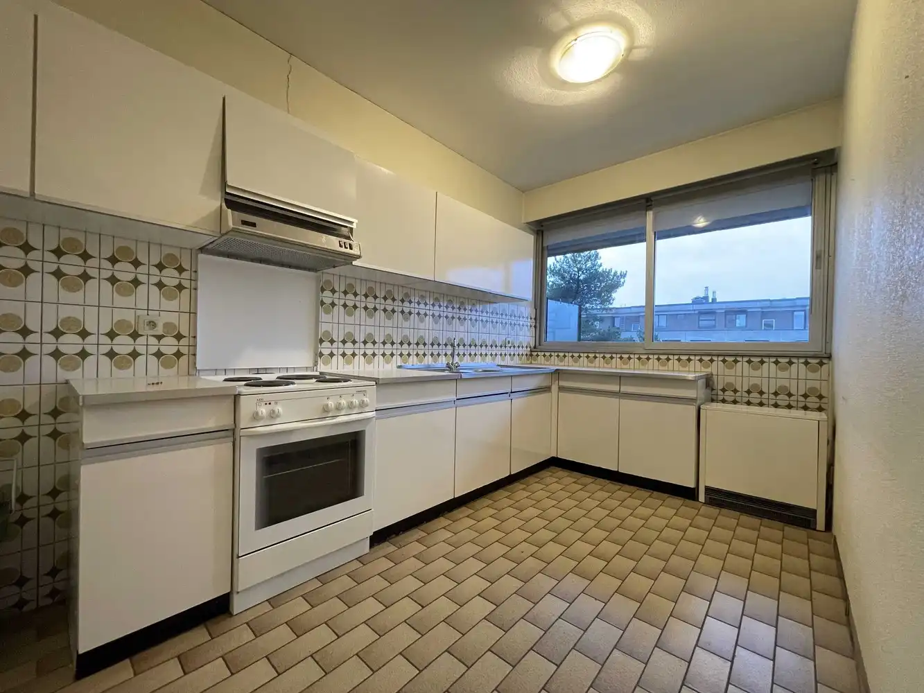 Goed gelegen drieslaapkamerappartement met garage foto 5