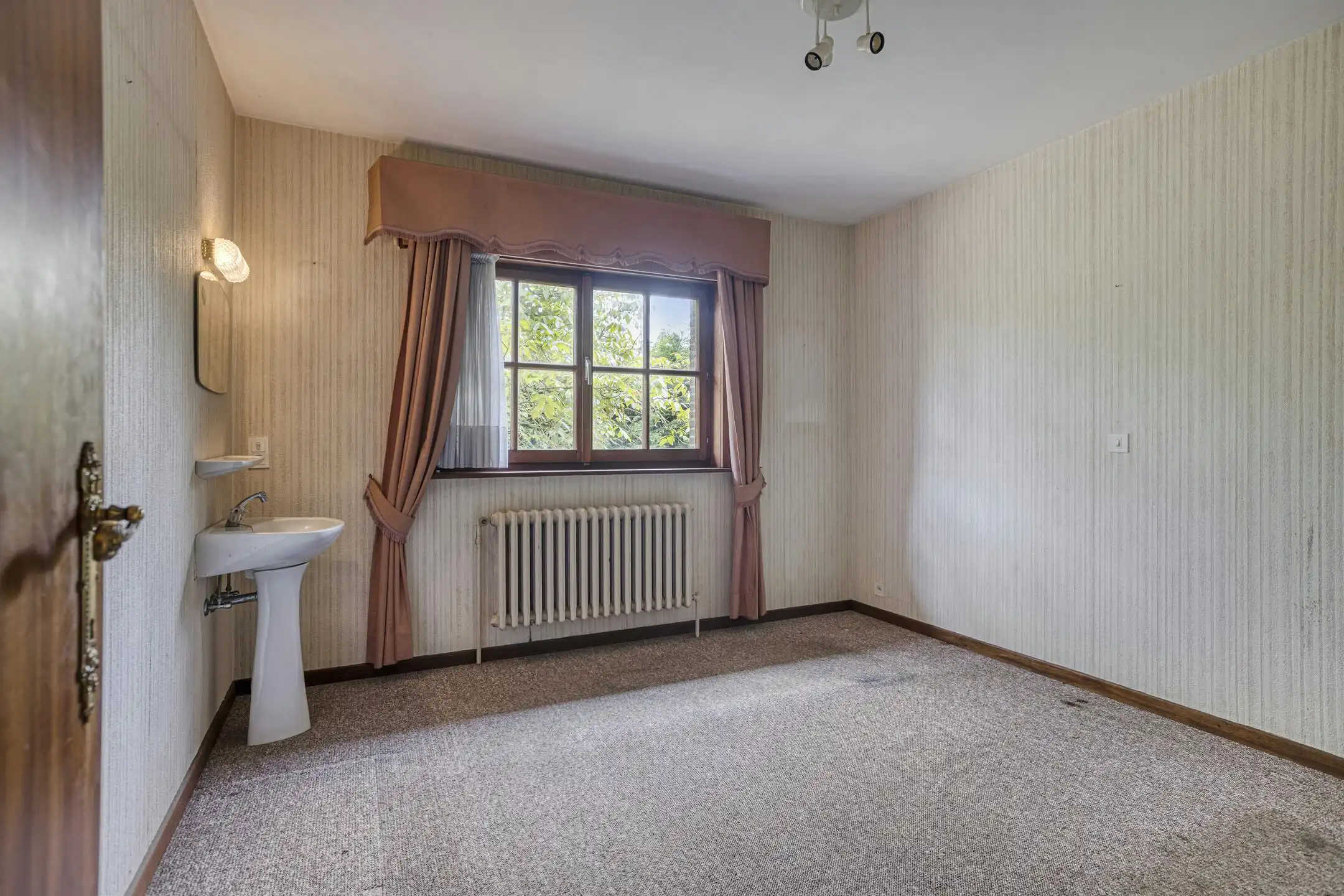 Te renoveren vrijstaande bungalow te koop in De Panne foto 8