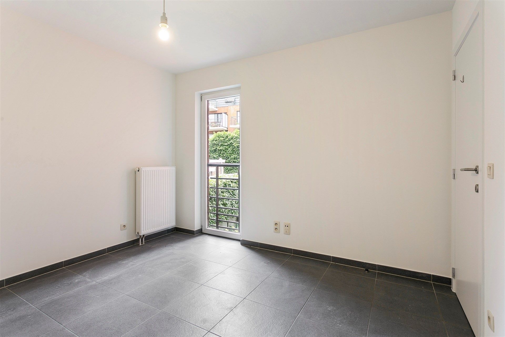 Gunstig gelegen lichtrijk energiezuinig 2 slaapkamer appartement met staanplaats foto 11