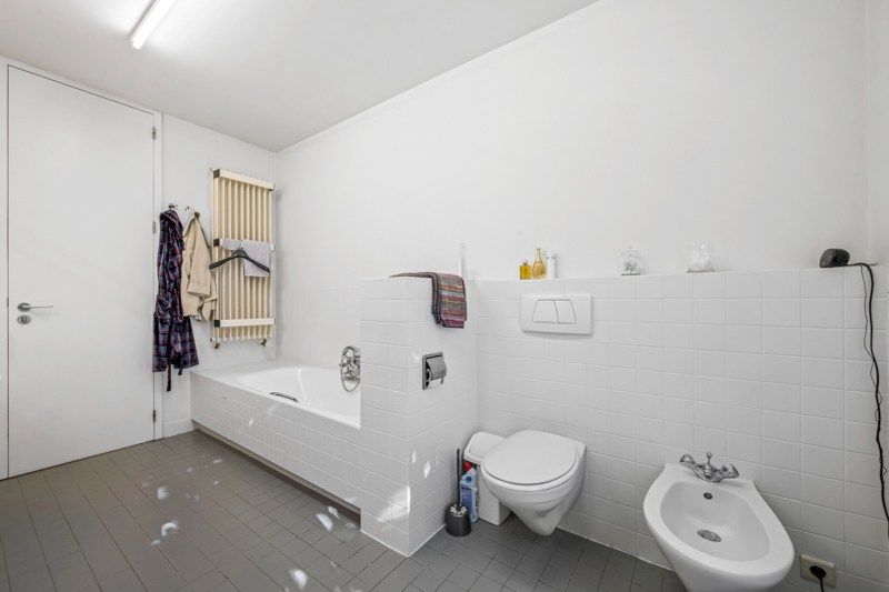 Instapklare architecturale woning met prachtige tuin en uitstekende ligging foto 24