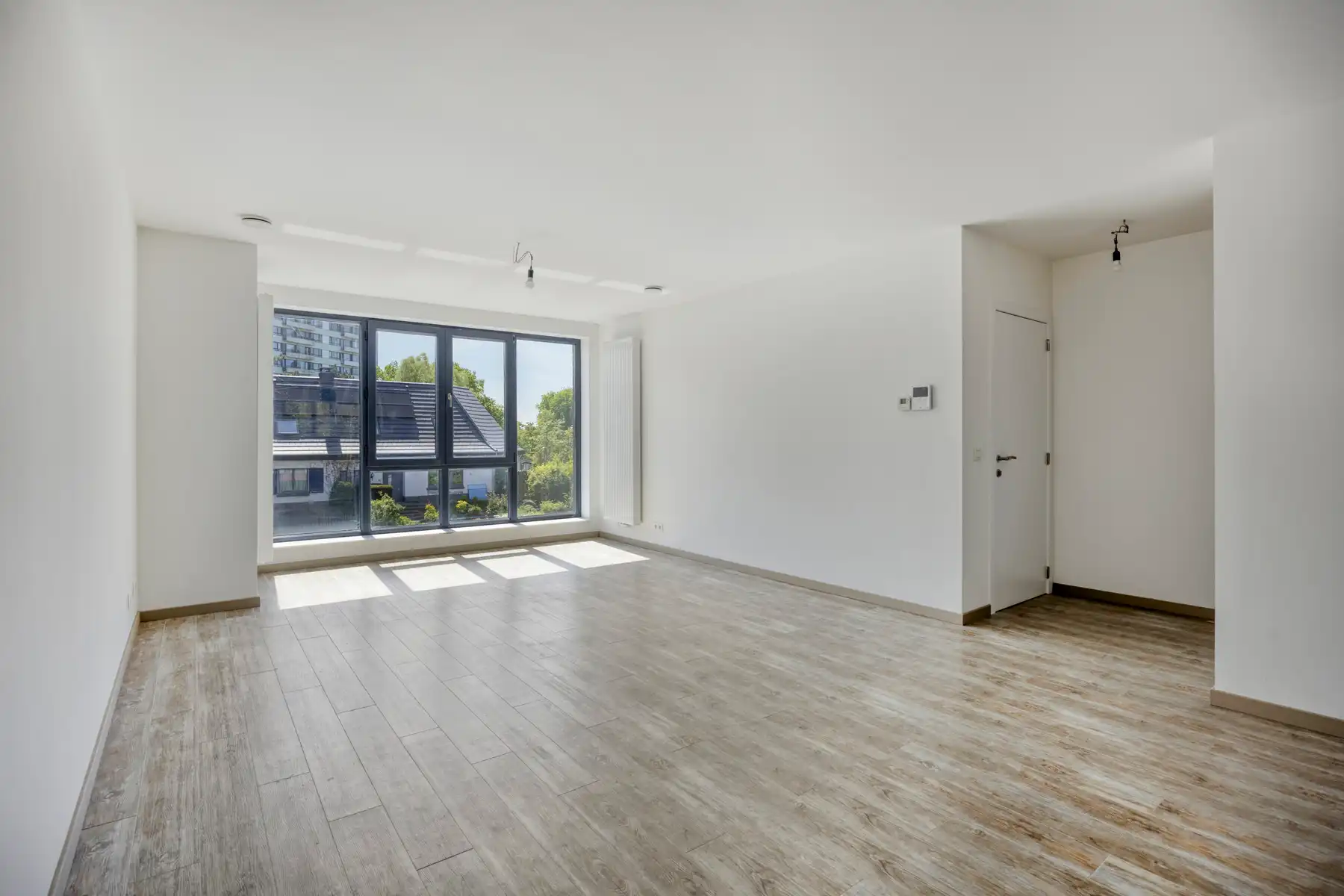 Nieuwbouw triplex met 4 slaap- en badkamers, tuin en parking foto 4
