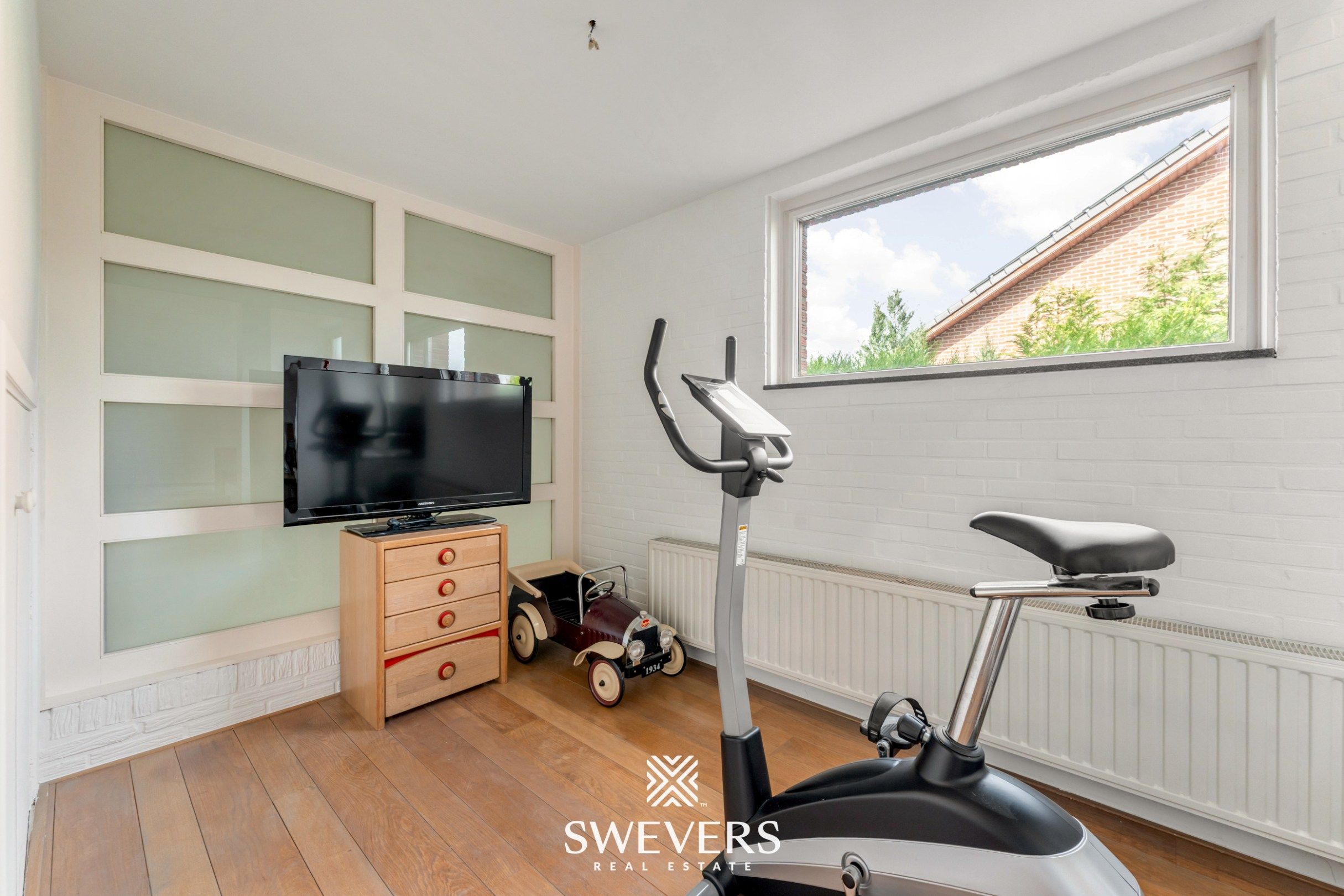 Knusse, hedendaagse gezinswoning met warme indeling en grote, zonnige tuin foto 19